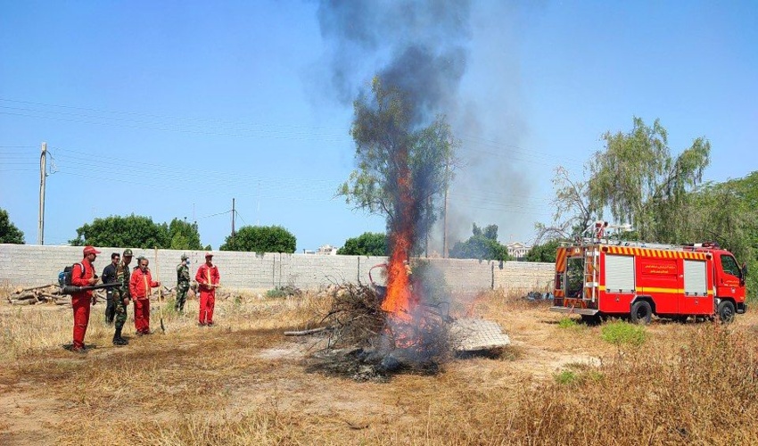 برگزاری کارگاه آموزشی و مانور اطفاء حریق درنهالستان مرکزی اداره منابع طبیعی شهرستان بوشهر 